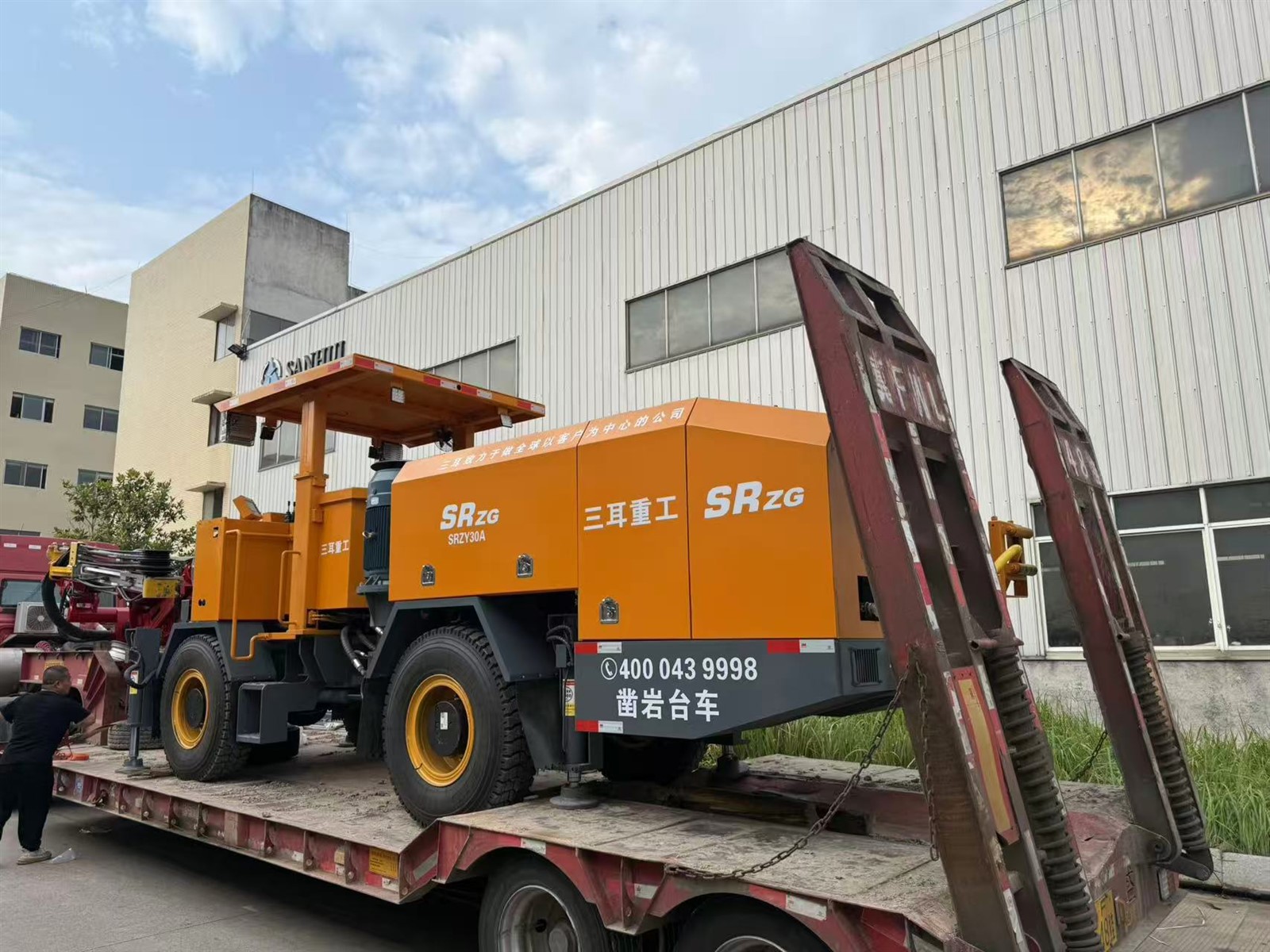 Rock drilling machine both for excavation and support for tunnel Rock drilling machine both for excavation and support for tunnel